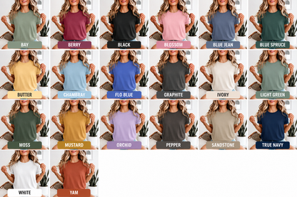 A color-options grid showing a woman modeling the same short-sleeve crew-neck T-shirt in many shades, with each color labeled underneath (for example Bay, Berry, Black, Blossom, Blue Jean, Blue Spruce, Butter, Chambray, Flo Blue, Graphite, Ivory, Light Green, Moss, Mustard, Orchid, Pepper, Sandstone, True Navy, White, Yam).
