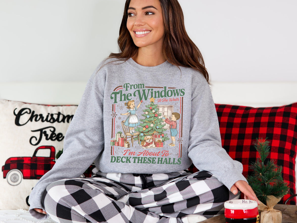 Funny retro Christmas sweatshirt featuring a vintage Christmas tree illustration and Deck These Halls holiday saying.
